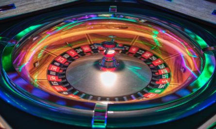 A spinning roulette wheel, waiting to see where the ball stops.